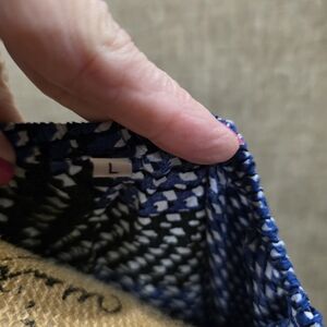 Blue and Black Patterned Garment